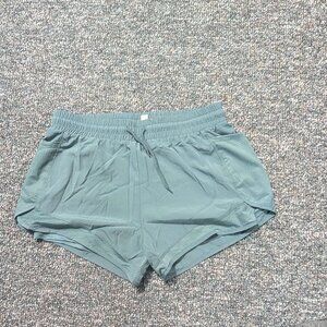 XL Womans Sports Shorts. Green/Teal in color. Brand New Never Worn